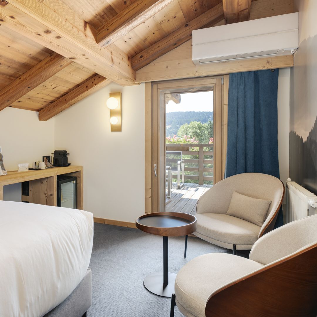 Chambre confort mansardée climatisée 